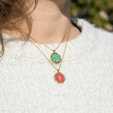 Green and red sparkle necklace on model