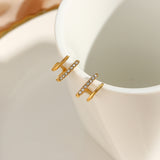 Dainty 18k gold earrings on stainless steel base featuring zirconias 